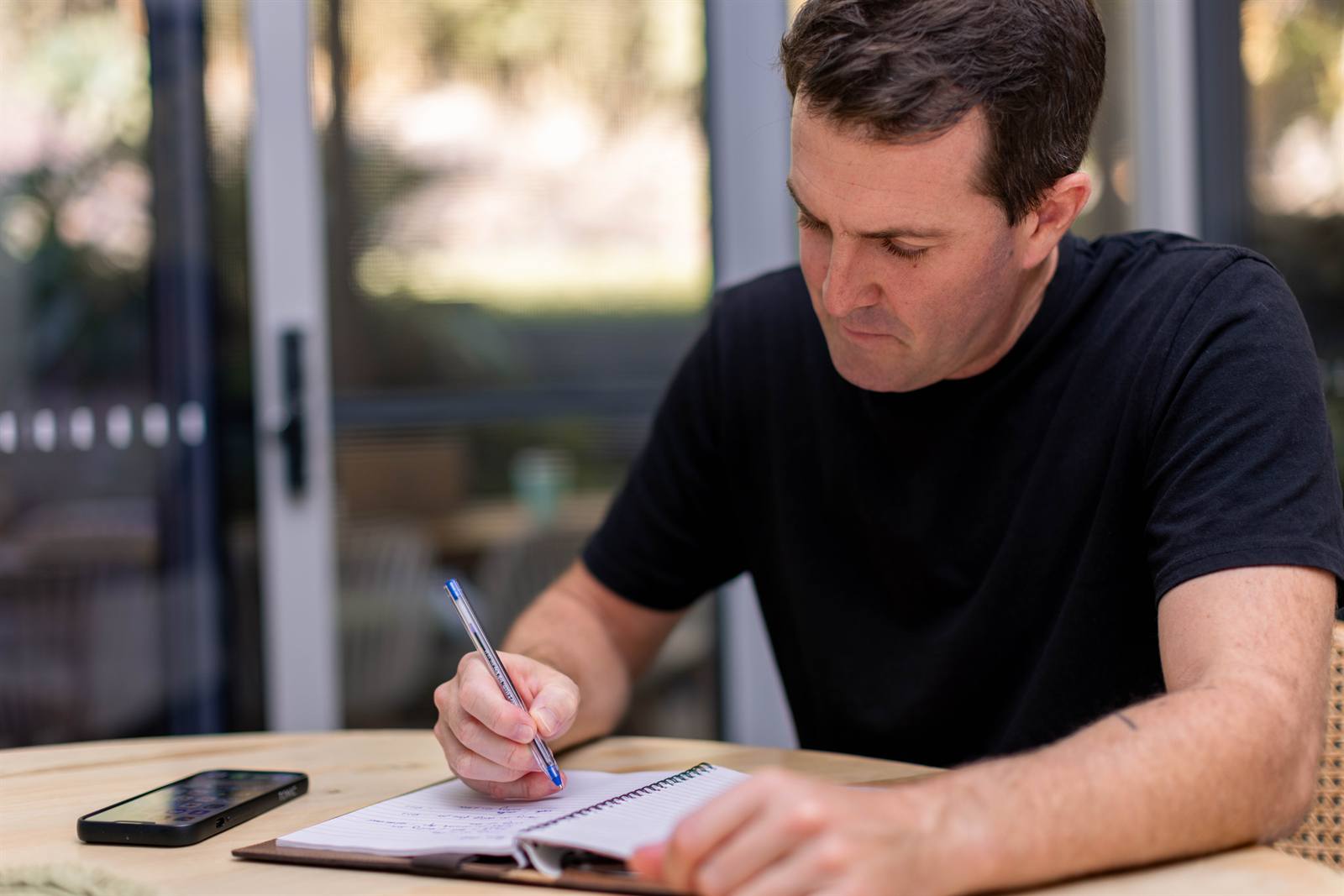 Chris working through a client's business plan